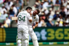 MELBOURNE, AUSTRALIA - DECEMBER 26: Dean Elgar (c) of South Africa clears his eyes during the Boxing Day Test Match between Australia and South Africa at The Melbourne Cricket Ground on December 26, 2022 in Melbourne, Australia. (Photo by Dave Hewison/Speed Media/Icon Sportswire)