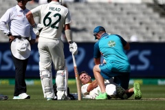 MELBOURNE, AUSTRALIA - DECEMBER 27: David Warner of Australia is seen by doctors after achieving his double century during the Boxing Day Test Match between Australia and South Africa at The Melbourne Cricket Ground on December 27, 2022 in Melbourne, Australia. (Photo by Dave Hewison/Speed Media/Icon Sportswire)