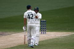 MELBOURNE, AUSTRALIA - DECEMBER 28: Cameron Green of Australia and Alex Carey of Australia bump fists during the Boxing Day Test Match between Australia and South Africa at The Melbourne Cricket Ground on December 27, 2022 in Melbourne, Australia. (Photo by Dave Hewison/Speed Media/Icon Sportswire)