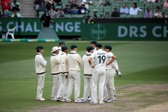 MELBOURNE, AUSTRALIA - DECEMBER 29: Mitchell Starc of Australia and his team mates await a DRS review during the Boxing Day Test Match between Australia and South Africa at The Melbourne Cricket Ground on December 29, 2022 in Melbourne, Australia. (Photo by Dave Hewison/Speed Media/Icon Sportswire)