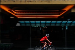 A bicyclist is seen braving the rain in Swanston Street during COVID-19 in Melbourne, Australia. Victoria has recorded 14 COVID related deaths including a 20 year old, marking the youngest to die from Coronavirus in Australia, and an additional 372 new cases overnight.