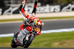 Phillip Island, Australia. 26 October, 2019. Dominique Aegerter (77) riding for Forward Racing Team (CHE) holds on during Free Practice 4 at the Promac Generac Australian MotoGP. Credit: Dave Hewison/Alamy Live News