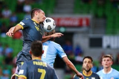MELBOURNE, AUSTRALIA - MARCH 12: Mark Milligan of Macarthur FC heads the ball during the Hyundai A-League soccer match between Melbourne City FC and Macarthur FC on March 12, 2021 at AAMI Park in Melbourne, Australia. (Photo by Speed Media/Icon Sportswire)